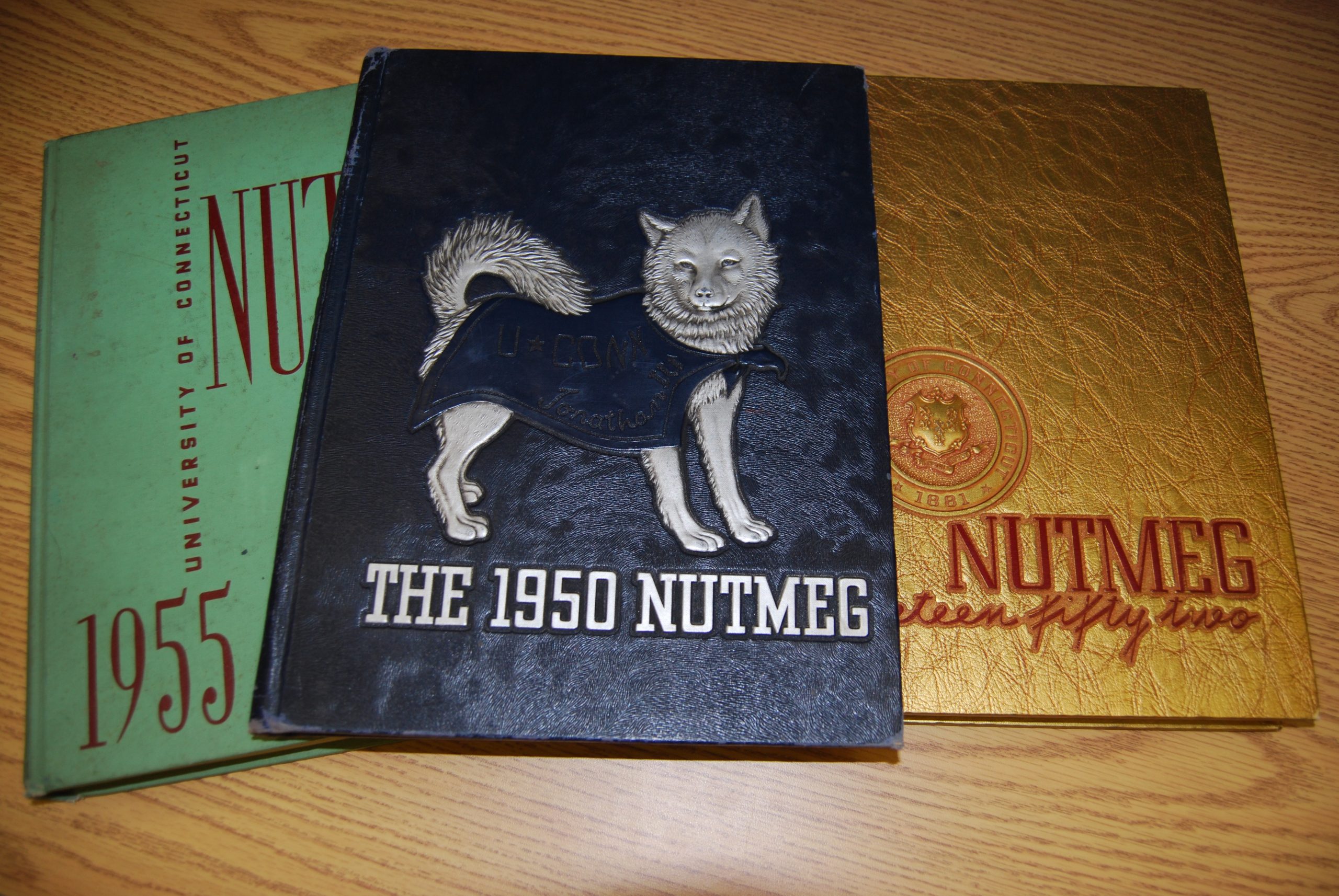 Nutmeg yearbooks on a table